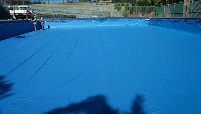 During: Pool liner nearly all cliped up getting ready for vacuum fit.