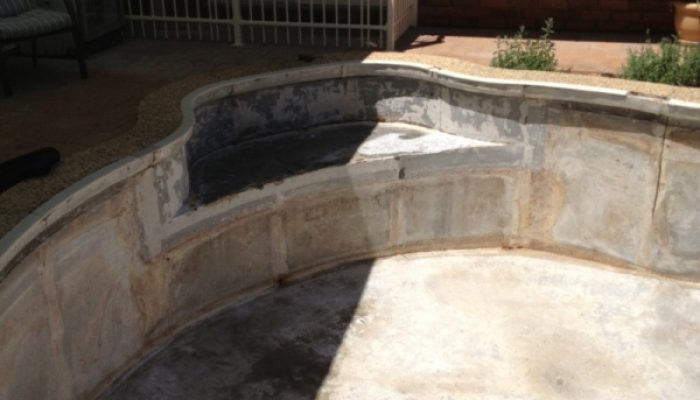 During: The pool is stripped back to a bare shell