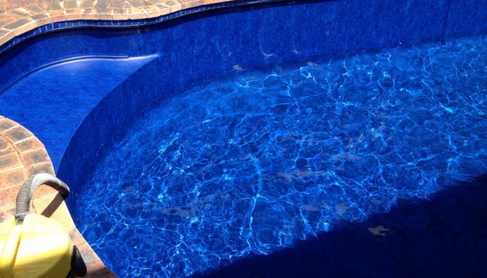 After: This poolfab pool looks great with its new Bahama pool liner.
